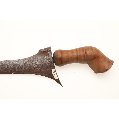 41 - A MALAYSIAN KRIS AND PART SCABBARD. The 33.5 cm straight edged pointed blade with low pamor, on a si... 
