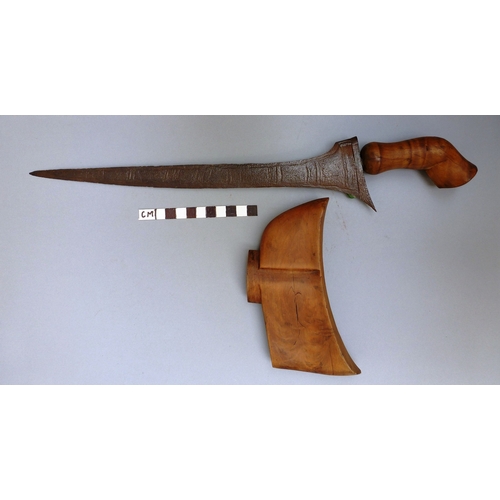 41 - A MALAYSIAN KRIS AND PART SCABBARD. The 33.5 cm straight edged pointed blade with low pamor, on a si... 