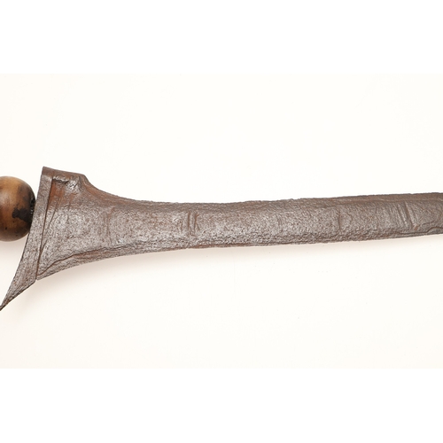 41 - A MALAYSIAN KRIS AND PART SCABBARD. The 33.5 cm straight edged pointed blade with low pamor, on a si... 
