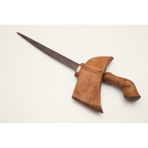 41 - A MALAYSIAN KRIS AND PART SCABBARD. The 33.5 cm straight edged pointed blade with low pamor, on a si... 