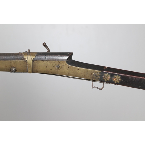 6 - A MATCHLOCK MUSKET, TORADAR INDIA. The 125 cm tapering barrel with deep brown patination, approximat... 