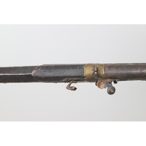 6 - A MATCHLOCK MUSKET, TORADAR INDIA. The 125 cm tapering barrel with deep brown patination, approximat... 