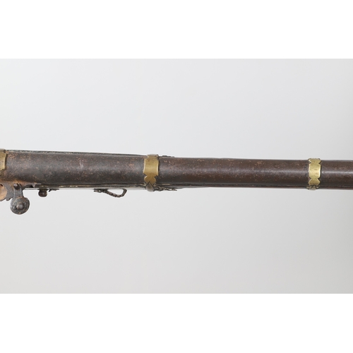 6 - A MATCHLOCK MUSKET, TORADAR INDIA. The 125 cm tapering barrel with deep brown patination, approximat... 