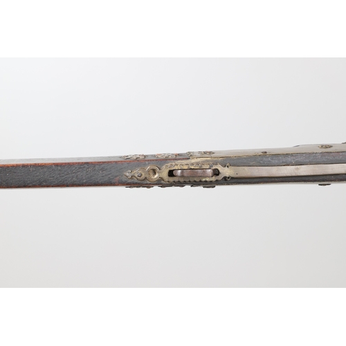 6 - A MATCHLOCK MUSKET, TORADAR INDIA. The 125 cm tapering barrel with deep brown patination, approximat... 
