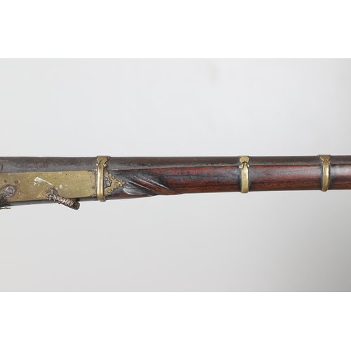 6 - A MATCHLOCK MUSKET, TORADAR INDIA. The 125 cm tapering barrel with deep brown patination, approximat... 