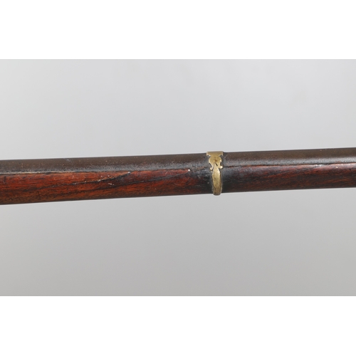 6 - A MATCHLOCK MUSKET, TORADAR INDIA. The 125 cm tapering barrel with deep brown patination, approximat... 