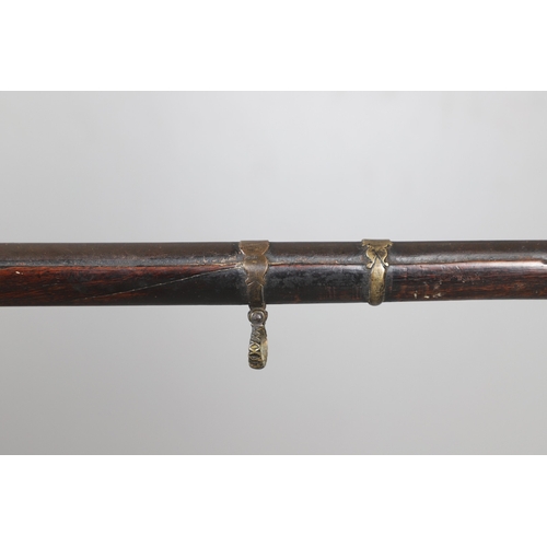 6 - A MATCHLOCK MUSKET, TORADAR INDIA. The 125 cm tapering barrel with deep brown patination, approximat... 