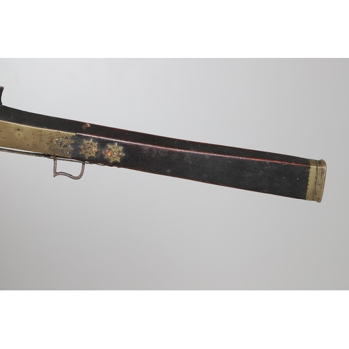 6 - A MATCHLOCK MUSKET, TORADAR INDIA. The 125 cm tapering barrel with deep brown patination, approximat... 