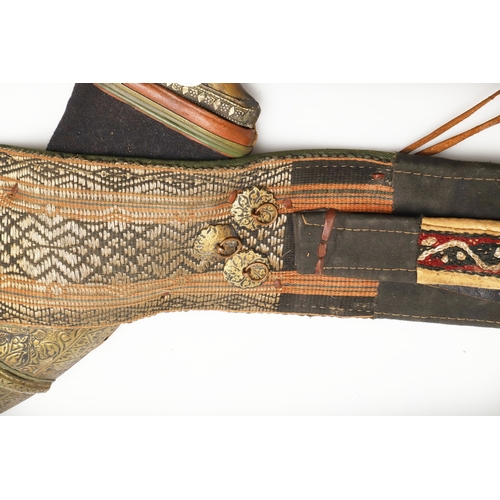 63 - A YEMENI JANABI KNIFE AND SCABBARD ON THE ORIGINAL BROAD BELT. The knife with a 22 cm curved blade w... 