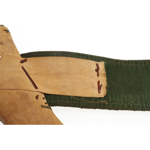 63 - A YEMENI JANABI KNIFE AND SCABBARD ON THE ORIGINAL BROAD BELT. The knife with a 22 cm curved blade w... 