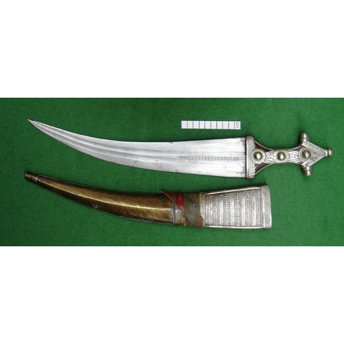 64 - A FINE LONG BLADED JANBIYYA AND SCABBARD. A Janbiyya having a 37 cm curved blade with shallow fuller... 