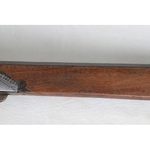7 - AN INDIAN MATCHLOCK LONG GUN. The 105 cm long barrel, tapering towards the slightly flared muzzle. F... 