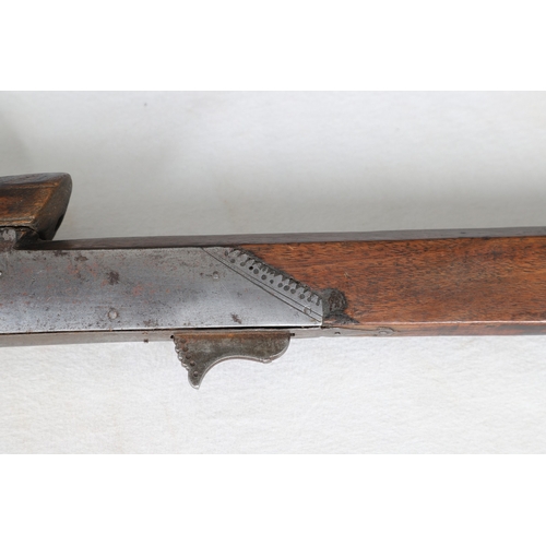 7 - AN INDIAN MATCHLOCK LONG GUN. The 105 cm long barrel, tapering towards the slightly flared muzzle. F... 