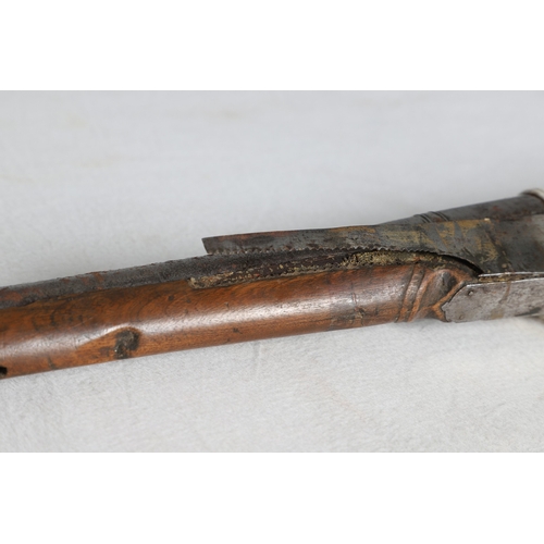 7 - AN INDIAN MATCHLOCK LONG GUN. The 105 cm long barrel, tapering towards the slightly flared muzzle. F... 