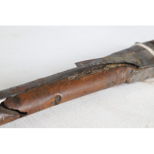 7 - AN INDIAN MATCHLOCK LONG GUN. The 105 cm long barrel, tapering towards the slightly flared muzzle. F... 