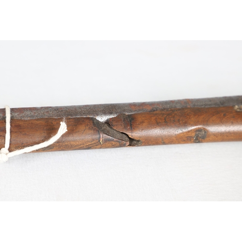 7 - AN INDIAN MATCHLOCK LONG GUN. The 105 cm long barrel, tapering towards the slightly flared muzzle. F... 