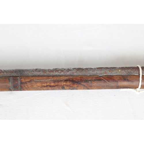 7 - AN INDIAN MATCHLOCK LONG GUN. The 105 cm long barrel, tapering towards the slightly flared muzzle. F... 