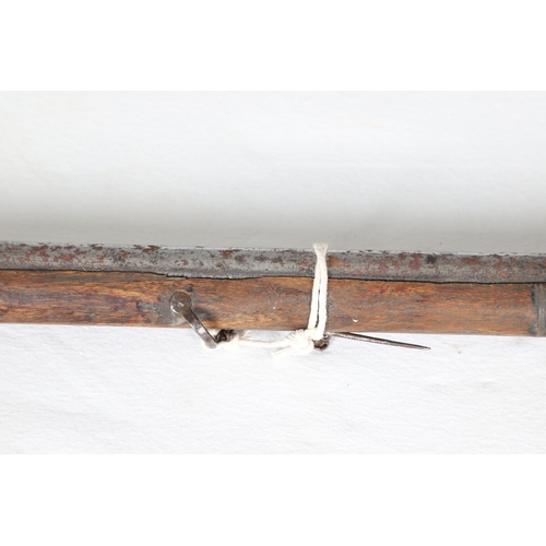 7 - AN INDIAN MATCHLOCK LONG GUN. The 105 cm long barrel, tapering towards the slightly flared muzzle. F... 