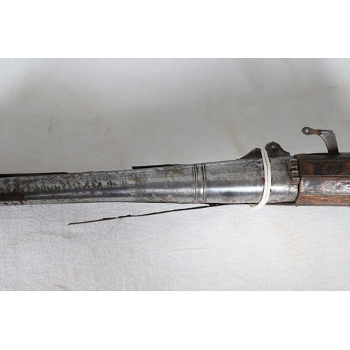 7 - AN INDIAN MATCHLOCK LONG GUN. The 105 cm long barrel, tapering towards the slightly flared muzzle. F... 