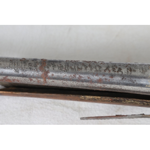 7 - AN INDIAN MATCHLOCK LONG GUN. The 105 cm long barrel, tapering towards the slightly flared muzzle. F... 