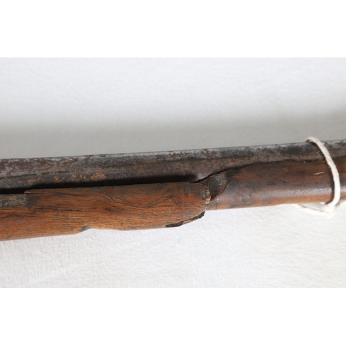 7 - AN INDIAN MATCHLOCK LONG GUN. The 105 cm long barrel, tapering towards the slightly flared muzzle. F... 