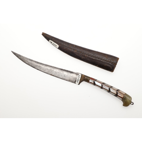 74 - AN INDIAN OR AFGHAN CHURRA KNIFE WITH JADEITE GRIP. The 12 cm gently curved, pointed blade with a sh... 
