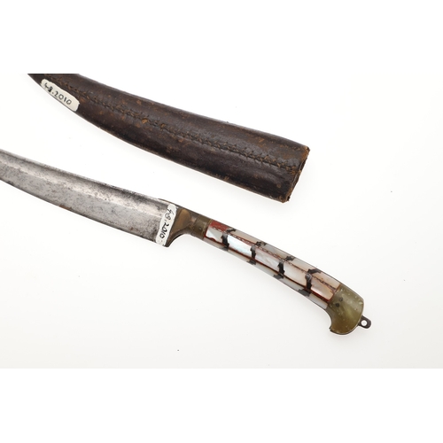 74 - AN INDIAN OR AFGHAN CHURRA KNIFE WITH JADEITE GRIP. The 12 cm gently curved, pointed blade with a sh... 