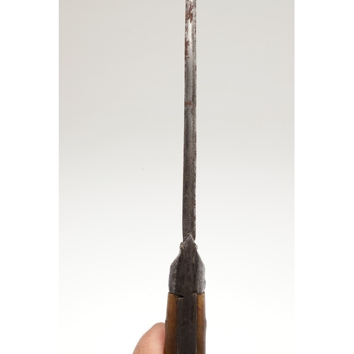 75 - A LONG BLADED KHYBER KNIFE WITH WOODEN GRIP. The 35 cm long tapering pointed, T section blade with a... 