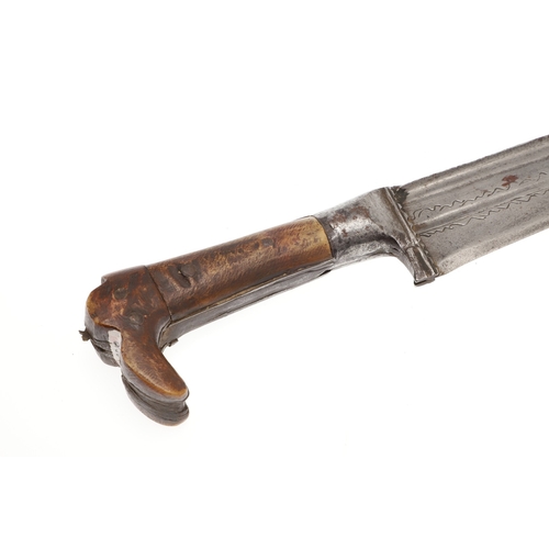 75 - A LONG BLADED KHYBER KNIFE WITH WOODEN GRIP. The 35 cm long tapering pointed, T section blade with a... 