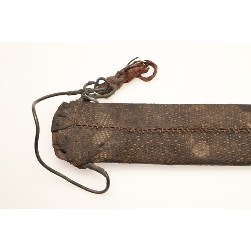 91 - A FANG KNIFE AND SCABBARD. A knife with a 40 cm pointed, spear shaped blade with central ridge, twin... 