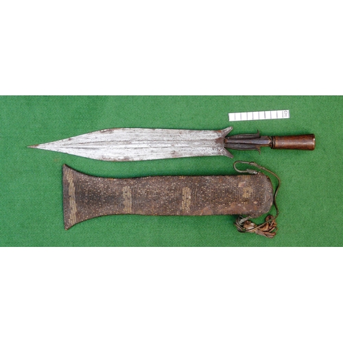91 - A FANG KNIFE AND SCABBARD. A knife with a 40 cm pointed, spear shaped blade with central ridge, twin... 