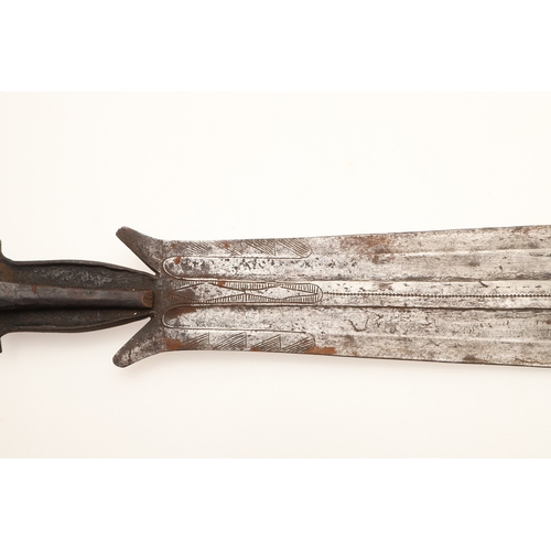 91 - A FANG KNIFE AND SCABBARD. A knife with a 40 cm pointed, spear shaped blade with central ridge, twin... 