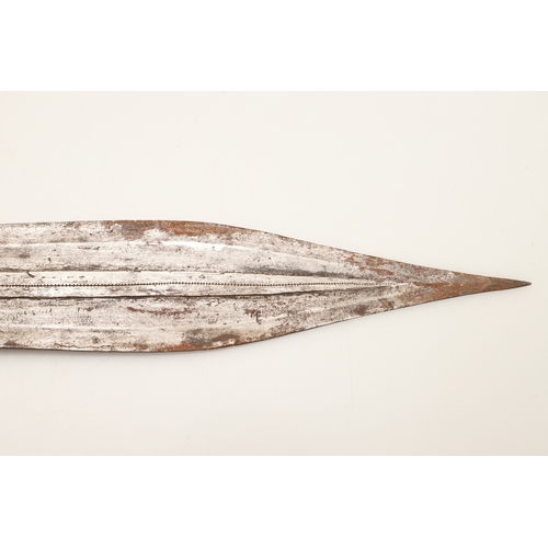 91 - A FANG KNIFE AND SCABBARD. A knife with a 40 cm pointed, spear shaped blade with central ridge, twin... 