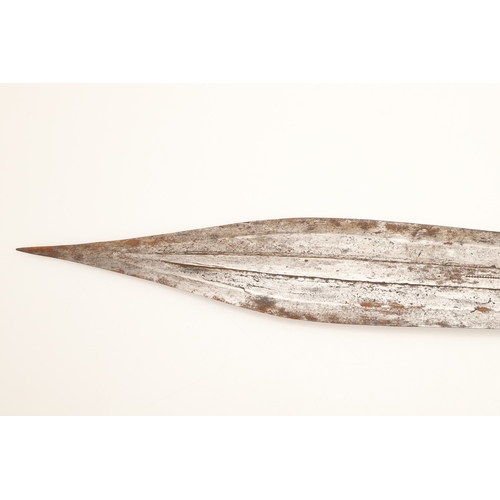 91 - A FANG KNIFE AND SCABBARD. A knife with a 40 cm pointed, spear shaped blade with central ridge, twin... 