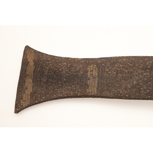 91 - A FANG KNIFE AND SCABBARD. A knife with a 40 cm pointed, spear shaped blade with central ridge, twin... 