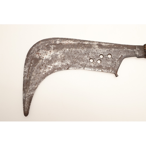 92 - A TROMBASH THROWING KNIFE OF THE MANGEBUTI PEOPLE. The blade 27 x 19 cm of a pronounced hook form, w... 
