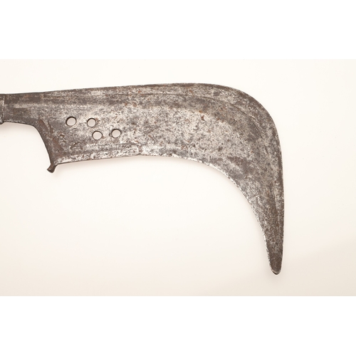 92 - A TROMBASH THROWING KNIFE OF THE MANGEBUTI PEOPLE. The blade 27 x 19 cm of a pronounced hook form, w... 