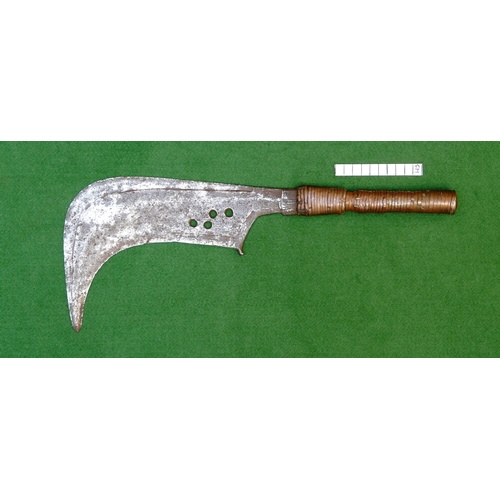 92 - A TROMBASH THROWING KNIFE OF THE MANGEBUTI PEOPLE. The blade 27 x 19 cm of a pronounced hook form, w... 