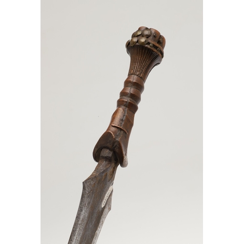 99 - A SALAMPASU KNIFE AND SCABBARD FROM SOUTHERN ZAIRE. The 45 cm blade of irregular outline with pointe... 