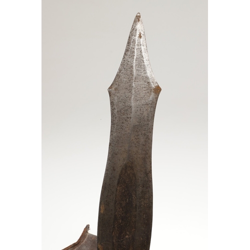 99 - A SALAMPASU KNIFE AND SCABBARD FROM SOUTHERN ZAIRE. The 45 cm blade of irregular outline with pointe... 