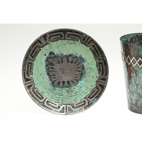 104 - GRAZIELLA LAFFI. TWO COPPER AND SILVER PERUVIAN STYLE ART PIECES. To include a plate (Diameter 25cm)... 