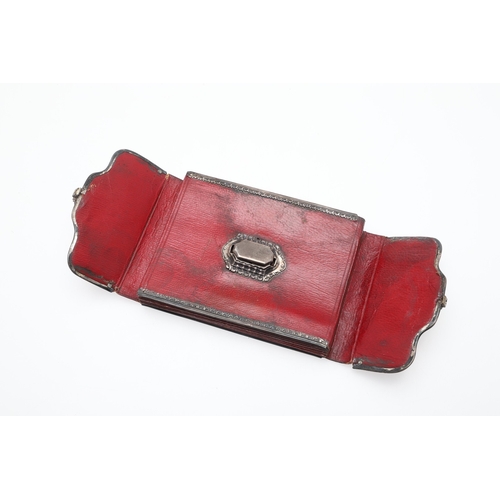 107 - AN EIGHTEENTH CENTURY SILVER MOUNTED WALLET. of red morocco leather with pierced silver mounts and l... 