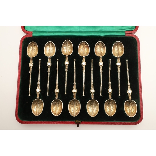 17 - A CASED SET OF TWELVE EDWARD VII SILVER GILT CORONATION ANOINTING SPOONS. Of decorative design, each... 