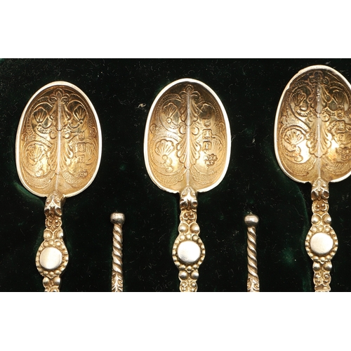 17 - A CASED SET OF TWELVE EDWARD VII SILVER GILT CORONATION ANOINTING SPOONS. Of decorative design, each... 