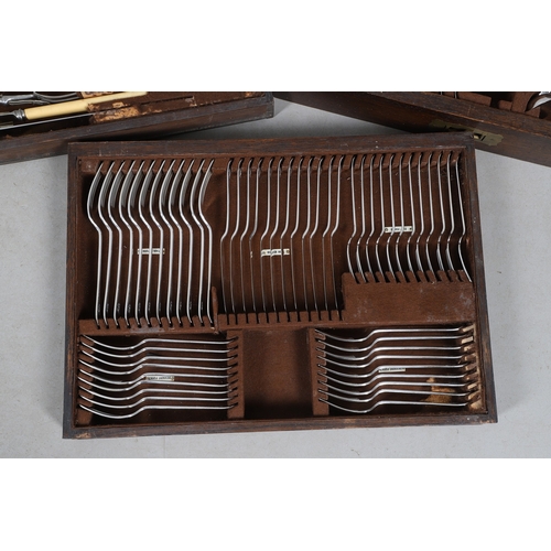 18 - A GEORGE V CANTEEN OF SILVER FLATWARE. Old English pattern, crested a rampant lion holding a halberd... 