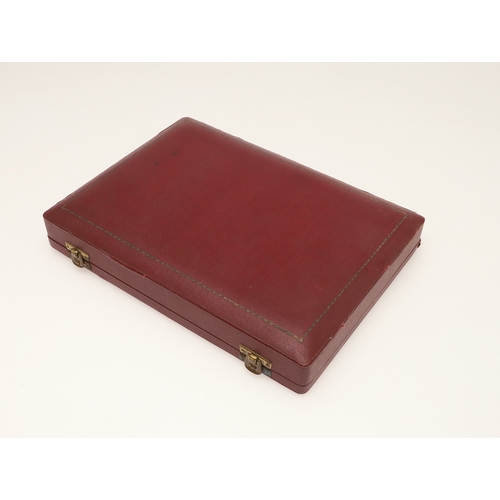 32 - AN EARLY 20TH CENTURY CASED FOUR PIECE SILVER QUAICH SET. The lined and fitted case to contain four ... 