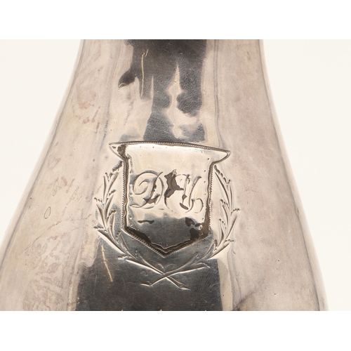 46 - A GEORGE III SILVER HOT WATER JUG. The lid with ball finial, the wooden handle with foliate decorate... 