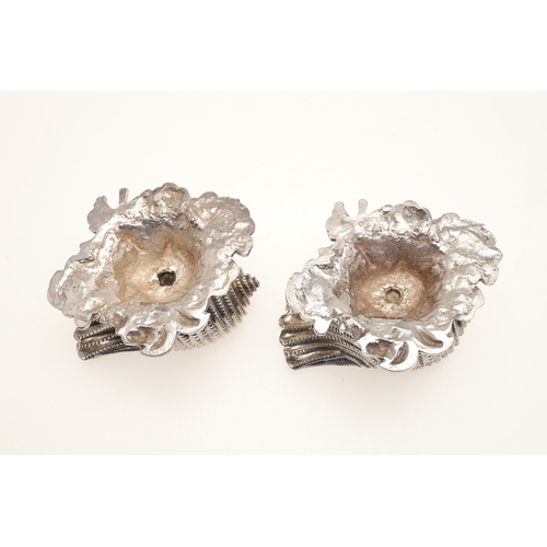 59 - A PAIR OF EARLY GEORGE IV SILVER SALTS IN THE FORM OF SEA SHELLS. On a cast naturalistic base, hallm... 