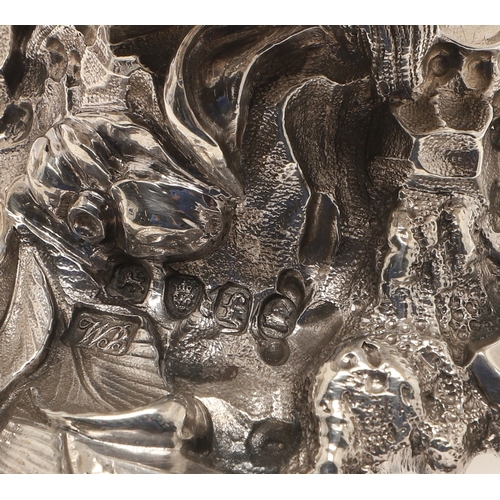 59 - A PAIR OF EARLY GEORGE IV SILVER SALTS IN THE FORM OF SEA SHELLS. On a cast naturalistic base, hallm... 