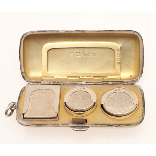 65 - A LATE VICTORIAN SILVER SOVEREIGN AND STAMP CASE. Of rectangular form with a suspensory loop, with e... 